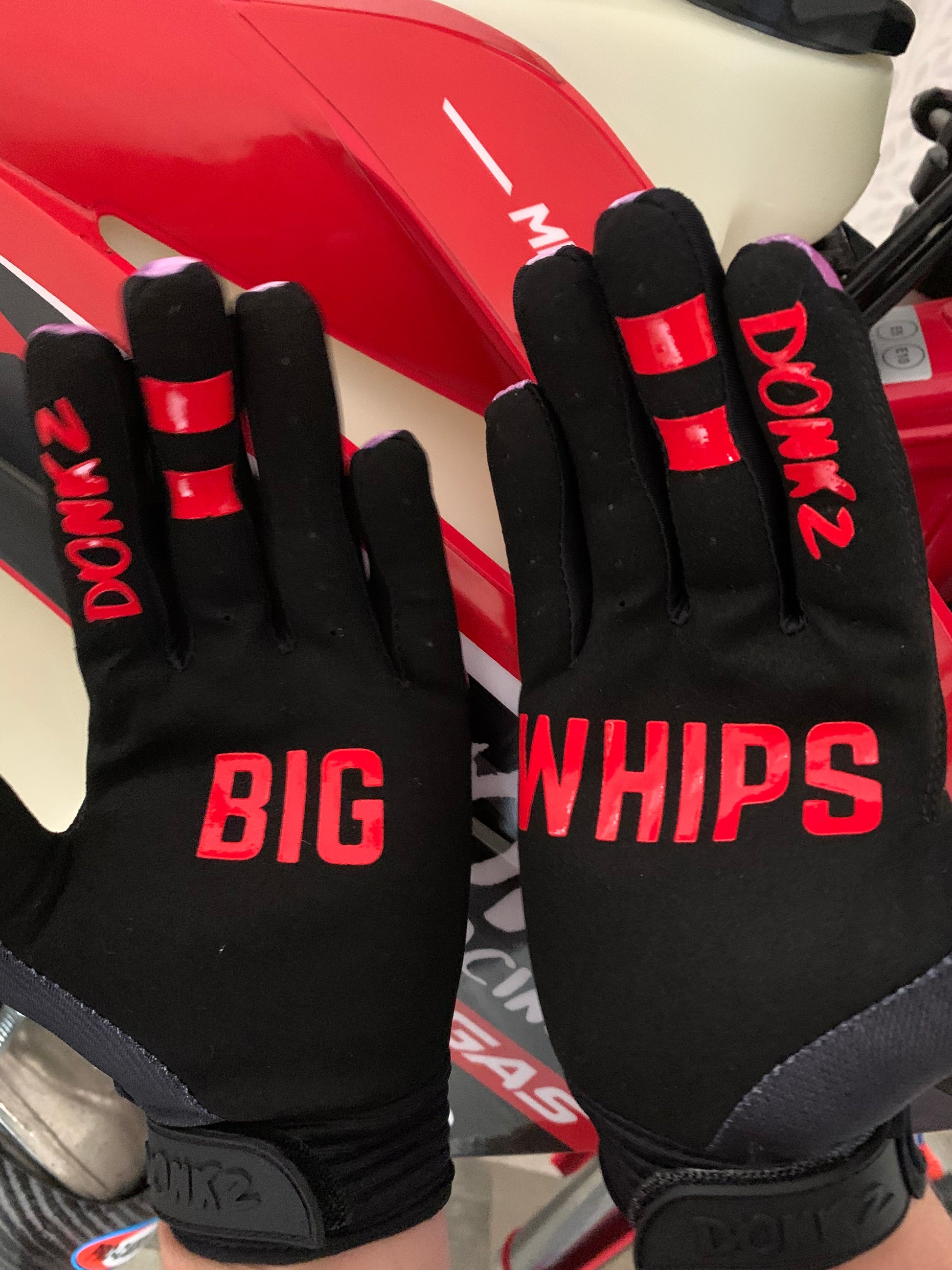 Palm of gloves with Big Whips print in red