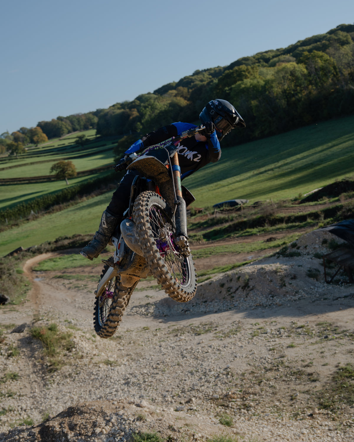 A rider in Donkz Racing kit jumping their bike